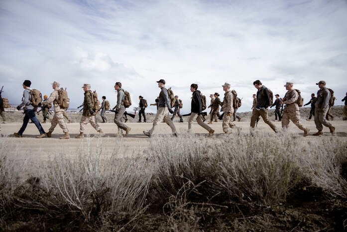 Officer Candidates with Recruiting Station (RS) Denver and RS Salt Lake City conduct a joint mock Officer Candidates School (OCS) at Camp Williams in Lehi, Utah from April 5-7, 2024.The 3-day event consisted of these candidates getting a glimpse into what OCS will be like. The candidates conducted physical training events, hikes, infantry tactics training and leadership reaction courses. (U.S. Marine Corps photo by Sgt. Lydia Gordon)