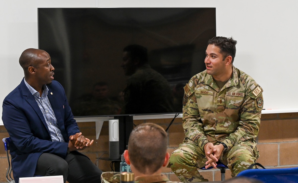 A guest speaker talks through an verbal exercise with an Airman