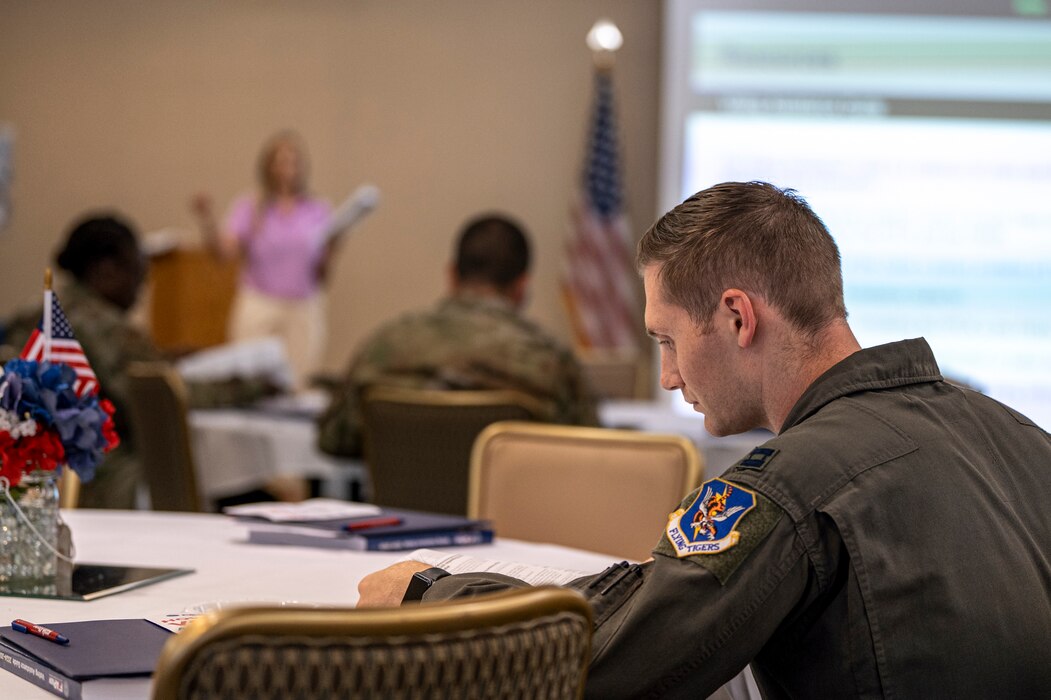 A U.S. Air Force Airman studies a workbook at a Voting Assistance Officer workshop at Moody Air Force Base, Georgia, April 24, 2024. VAOs help military members, their families and overseas citizens to successfully vote despite being on foreign soil. (U.S. Air Force photo by Airman 1st Class Leonid Soubbotine)