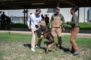 On April 2, 2024, the family of Robert ‘Bob’ Throneburg pays a visit to the 341st Training Squadron, at Joint Base San Antonio-Lackland, reflecting on the enduring legacy of Military Working Dog Nemo and Bob Throneburg. The impact of Nemo and Throneburg continues to resonate within the MWD community. (U.S. Air Force photo by 2nd Lt. Kate Anderson)