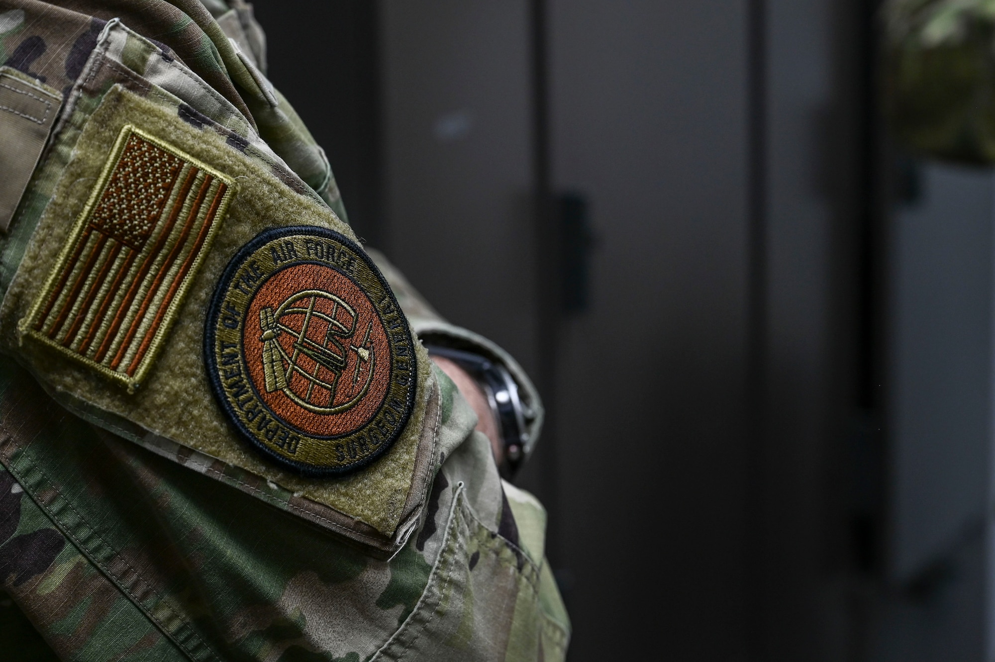 A patch is shown on an General's arm.