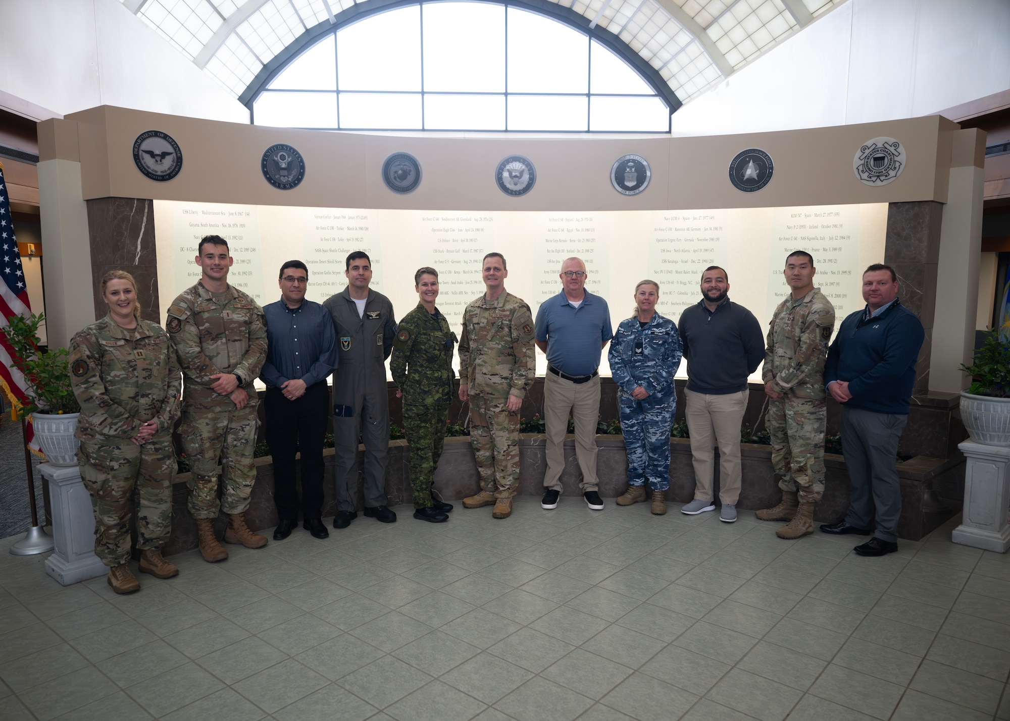 Foreign Liaison Officers pose for a photo during an orientation at Air Force Mortuary Affairs Operations on Dover Air Force Base, Delaware, April 24, 2024. This visit gave the Foreign Liaison Officers a chance to learn about AFMAO’s role in honoring our fallen. (U.S. Air Force photo by Staff Sgt. Jayden Ford)