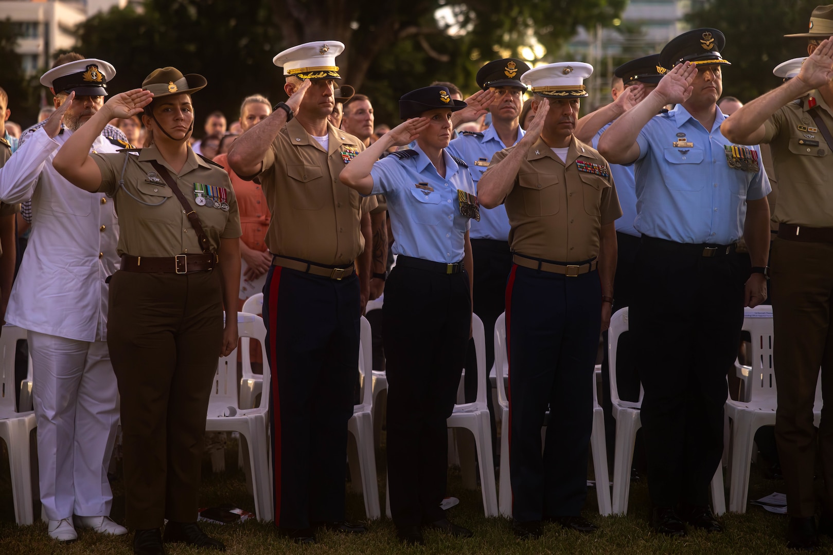U.S. Marine Corps Col. Brian T. Mulvihill, center right, the commanding officer of Marine Rotational Force – Darwin 24.3, and Lt. Col. Scott Stafford, center left, the executive officer of MRF-D-24.3, salute during the 109th commemorative service in honor of Anzac Day at Darwin Cenotaph War Memorial, NT, Australia, April 25, 2024. Anzac Day marks the landings in Gallipoli of Australian and New Zealand Army Corps soldiers in 1915, and commemorates all Australian personnel who served and died in wars, conflicts, and peacekeeping operations. MRF-D 24.3 Marines and Sailors showed their support to the Australian Defence Force personnel commemorating Anzac Day through dawn services and other commemorative services. Mulvihill is a native of New York. Stafford is a native of Indiana. (U.S. Marine Corps photo by Cpl. Juan Torres)