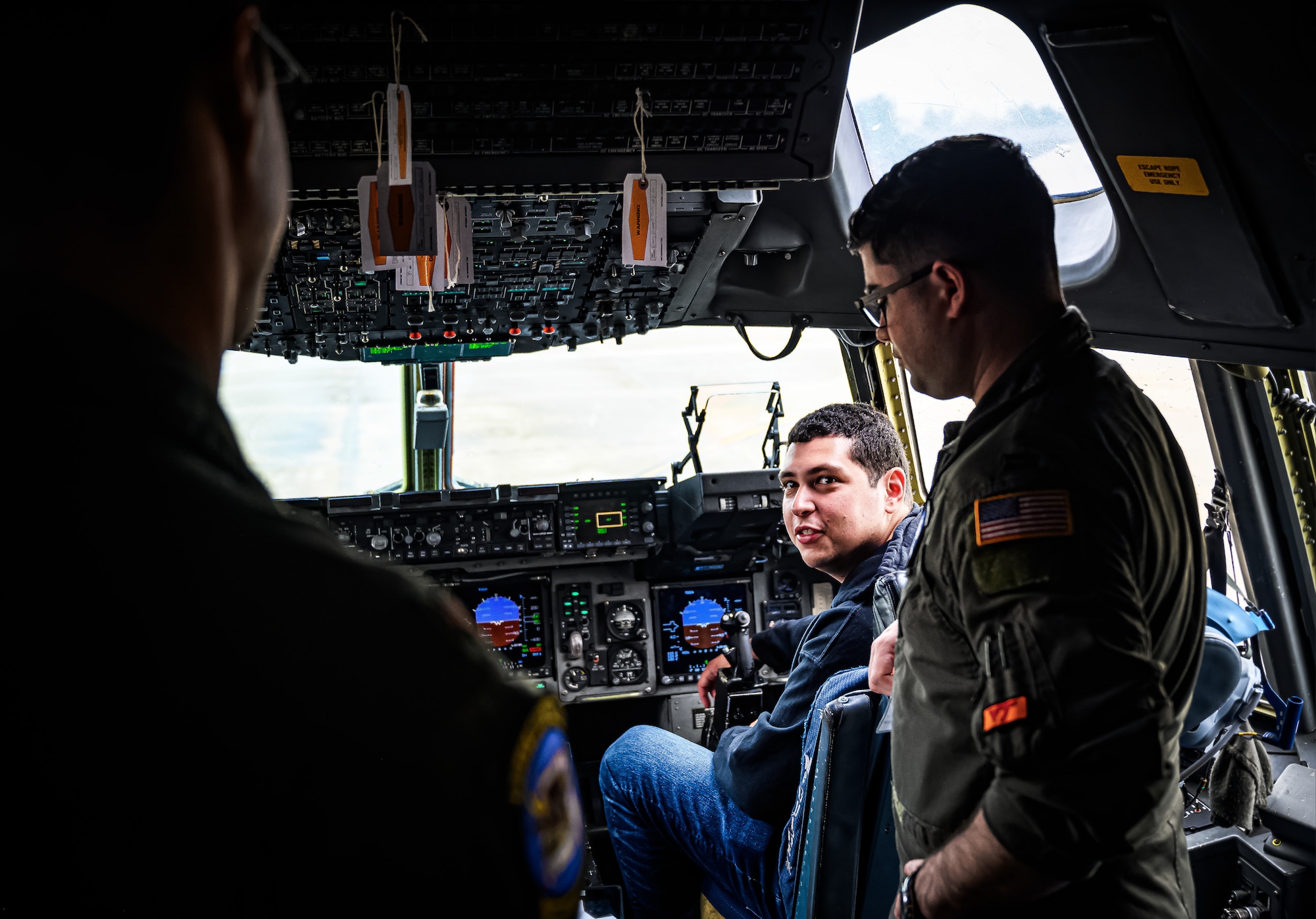 A civilian pilot tours the cockpit of a C-17 Globemaster III at Joint Base McGuire-Dix-Lakehurst, N.J., April 20, 2024. The Mid-Air Collision Avoidance program is designed to ensure safety practices are observed between military and civilian pilots who share a common airspace. (U.S. Air Force photo by Senior Airman Matt Porter)