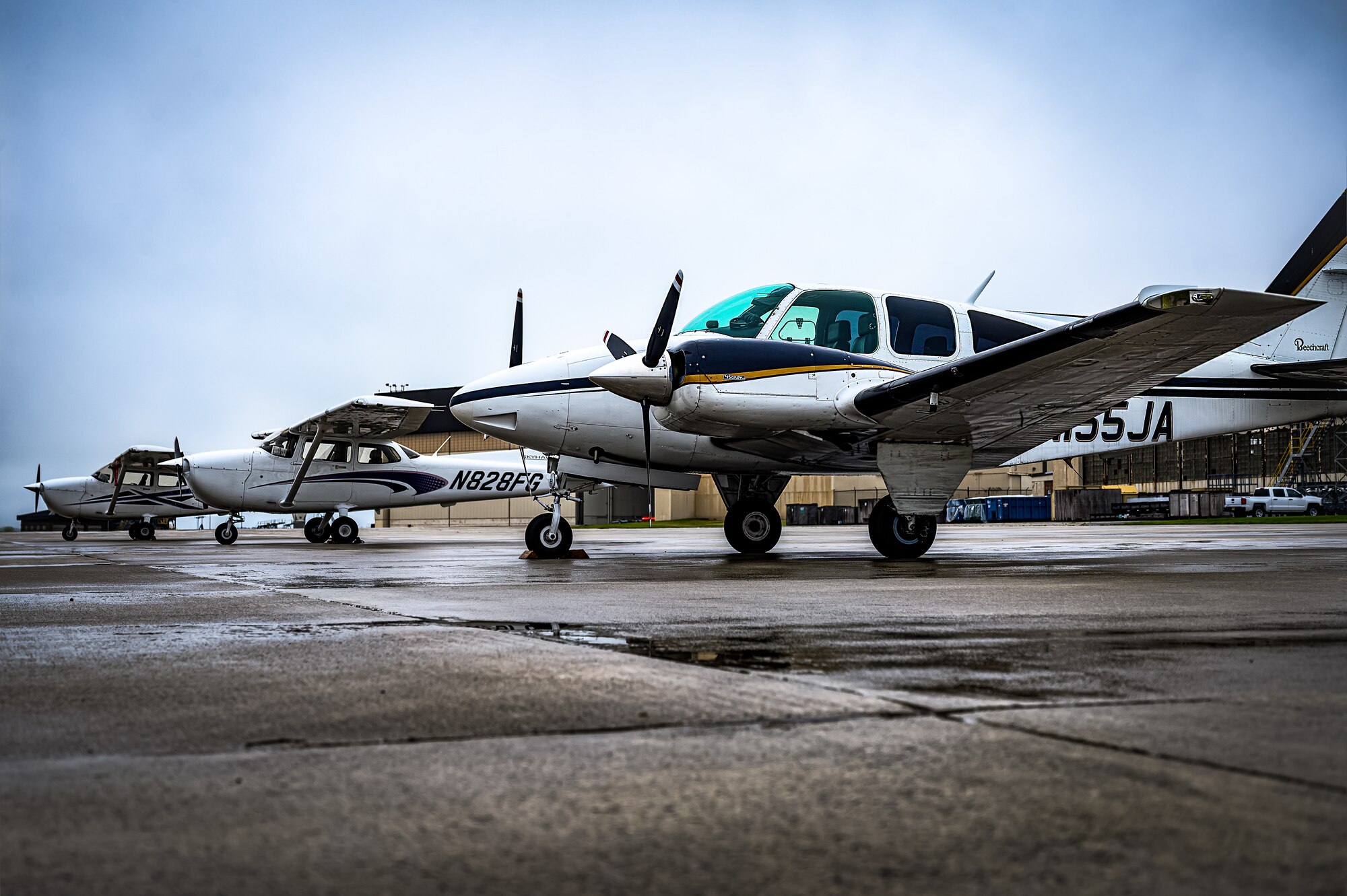 Multiple Cessna 172 aircraft park on the flight line at Joint Base McGuire-Dix-Lakehurst, N.J., April 20, 2024. The Mid-Air Collision Avoidance program is designed to ensure safety practices are observed between military and civilian pilots who share a common airspace. (U.S. Air Force photo by Senior Airman Matt Porter)