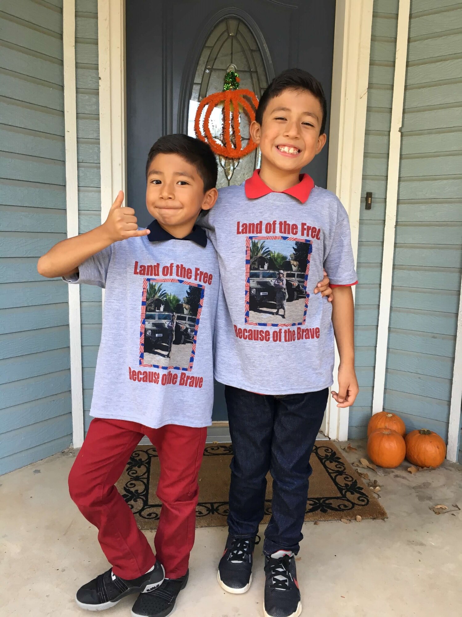 U.S. Air Force military children, Anthony and Ayden, pose for a photo on Veterans Day in 2016. Their father was serving on a short tour assignment for 15 months. Month of the Military Child highlights and recognizes the sacrifices, resilience and perseverance of military children. (U.S. Air Force courtesy photo)
