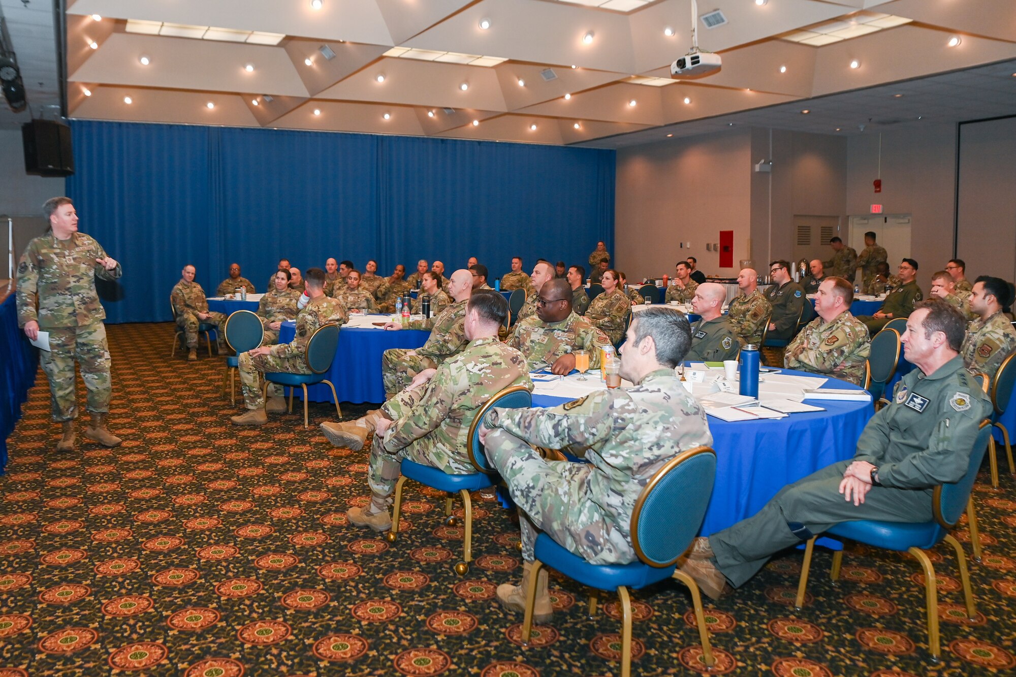 Chief Master Sgt. Jeremiah Ross, 7th Air Force command chief, leads a discussion on Air Force standards during the 7th Air Force Leadership Summit, April 3, 2024.