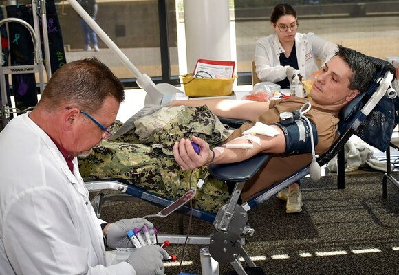 20240422-N-QW460-1039 (BREMERTON, WA) Hospital Corpsman 2nd Class Joseph Towery assigned to Naval Hospital Bremerton and Reno, Nevada native donates his blood at the command, April 22, 2024 during a a blood drive held in coordination with Madigan Army Medical Center and the Armed Services Blood Program which collected 23 vitally needed unit. (Official Navy photo by Mass Communication 2nd Class Jennifer Benedict, NHB/NMRTC Bremerton public affairs)