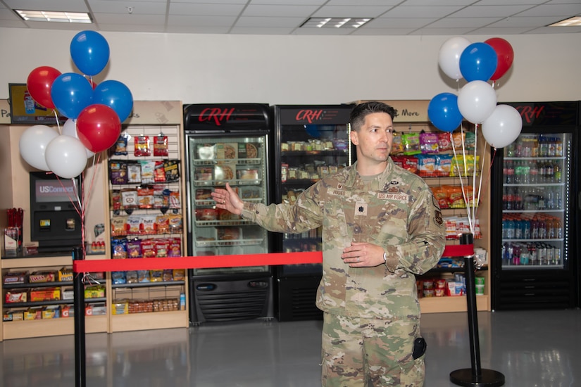 U.S. Air Force Lt. Col. Tyler J. Hughes, 316th Security Forces Squadron commander, talks about the opening of a new unattended retail unit in the Security Forces building during a ribbon cutting ceremony at Joint Base Andrews, Md., April 25, 2024