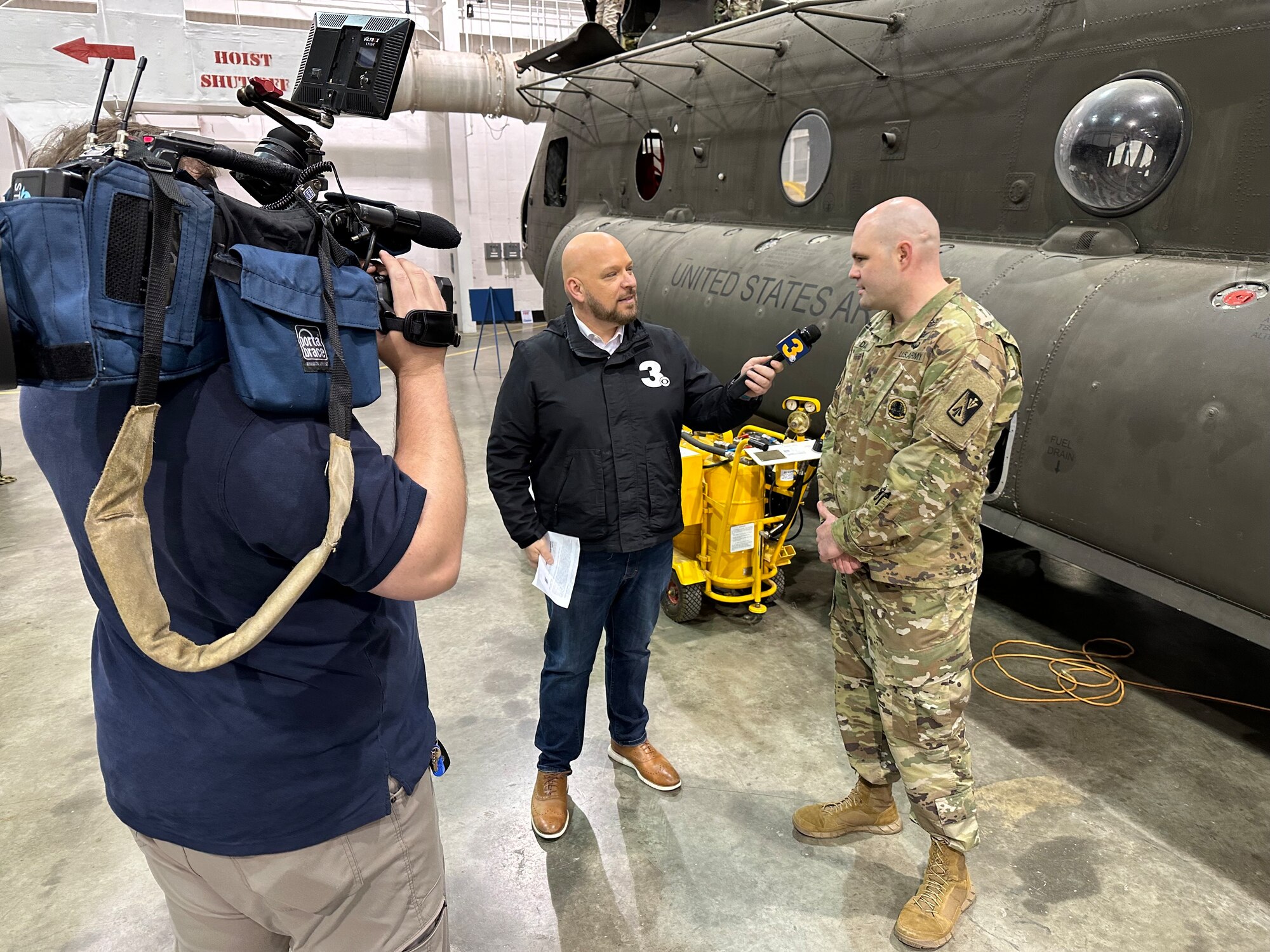 A journalist interviews a Soldier.