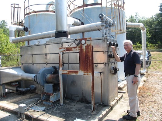 A man standing, Dave Becker, a geologist with the Environmental and Munitions Center of Expertise at the Engineering and Support Center, Huntsville, conducts an optimization study at the Charles Macon Superfund site in North Carolina in fall 2015.