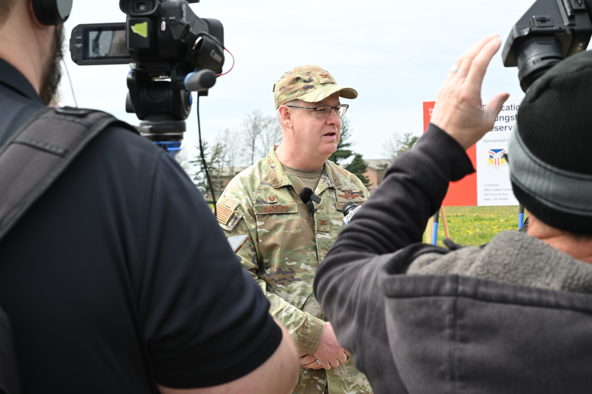 910th Airlift Wing Commander Col. Mike Maloney talks with media representatives after a main gate relocation and upgrade project groundbreaking ceremony at Youngstown Air Reserve Station, Ohio, April 23, 2024.