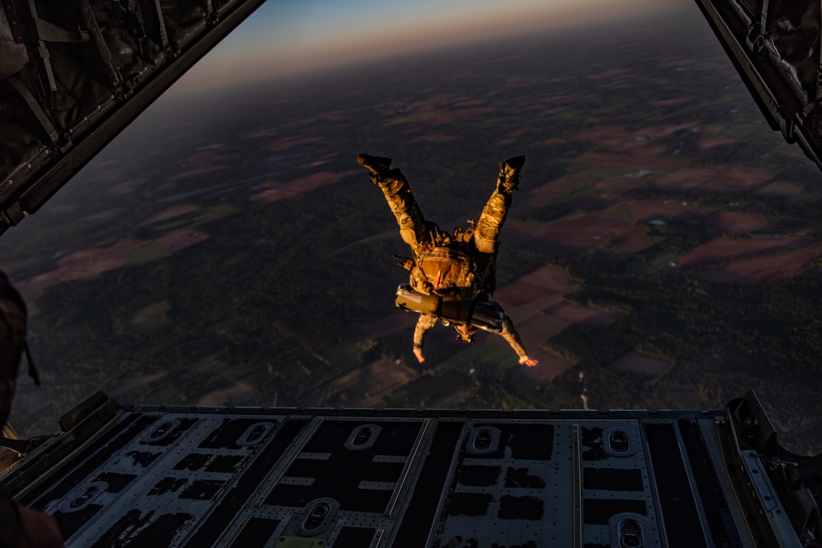An Airman assigned to the 38th Rescue Squadron performs a military free fall jump from an HC-130J Combat King II over Moody Air Force Base, Ga., April 12, 2024. During exercise Ready Tiger 24-1, inspectors assessed the 23rd Wing's proficiency in employing decentralized command and control to fulfill air tasking orders across geographically dispersed areas amid communication challenges. (U.S. Air Force photo by Senior Airman Courtney Sebastianelli)