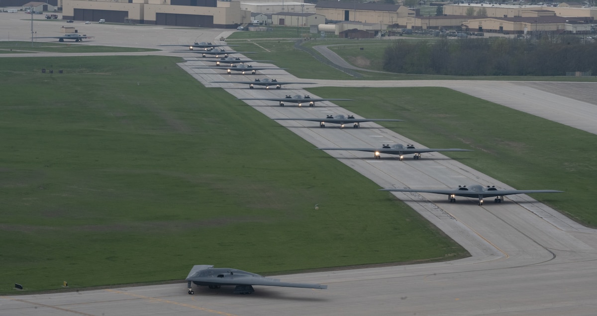 B-2 Spirit stealth bombers assigned to the 509th Bomb Wing taxi on the runway at Whiteman Air Force Base, Mo., April 15, 2024. Whiteman AFB Airmen executed a mass fly-off of 12 B-2s to cap off the annual Spirit Vigilance exercise. (U.S. Air Force photo by Airman 1st Class Hailey Farrell)