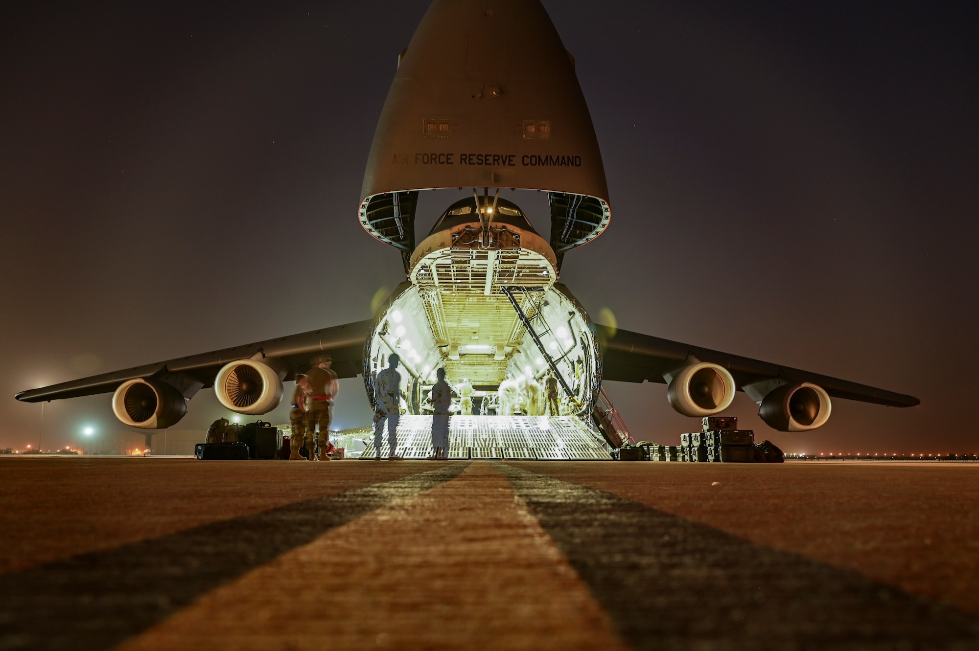 A U.S. Air Force C-5 Galaxy is positioned on the flightline