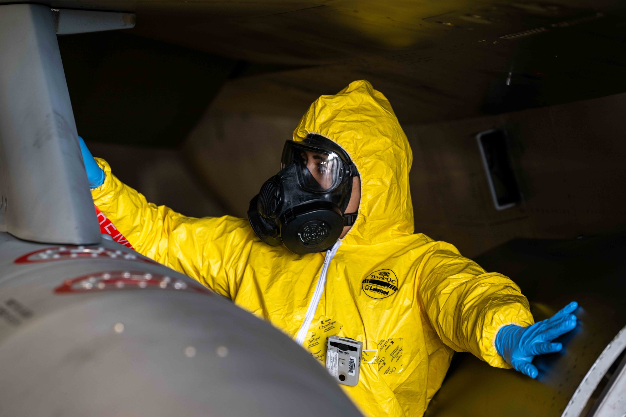 U.S. Air Force Tech. Sgt. Kayla Bradford, 480th Fighter Generation Squadron Inspection Section doc chief, conducts a decontamination safety sweep on an F-16 Fighting Falcon fighter jet during exercise Radiant Falcon at Spangdahlem Air Base, Germany, April 24, 2024.