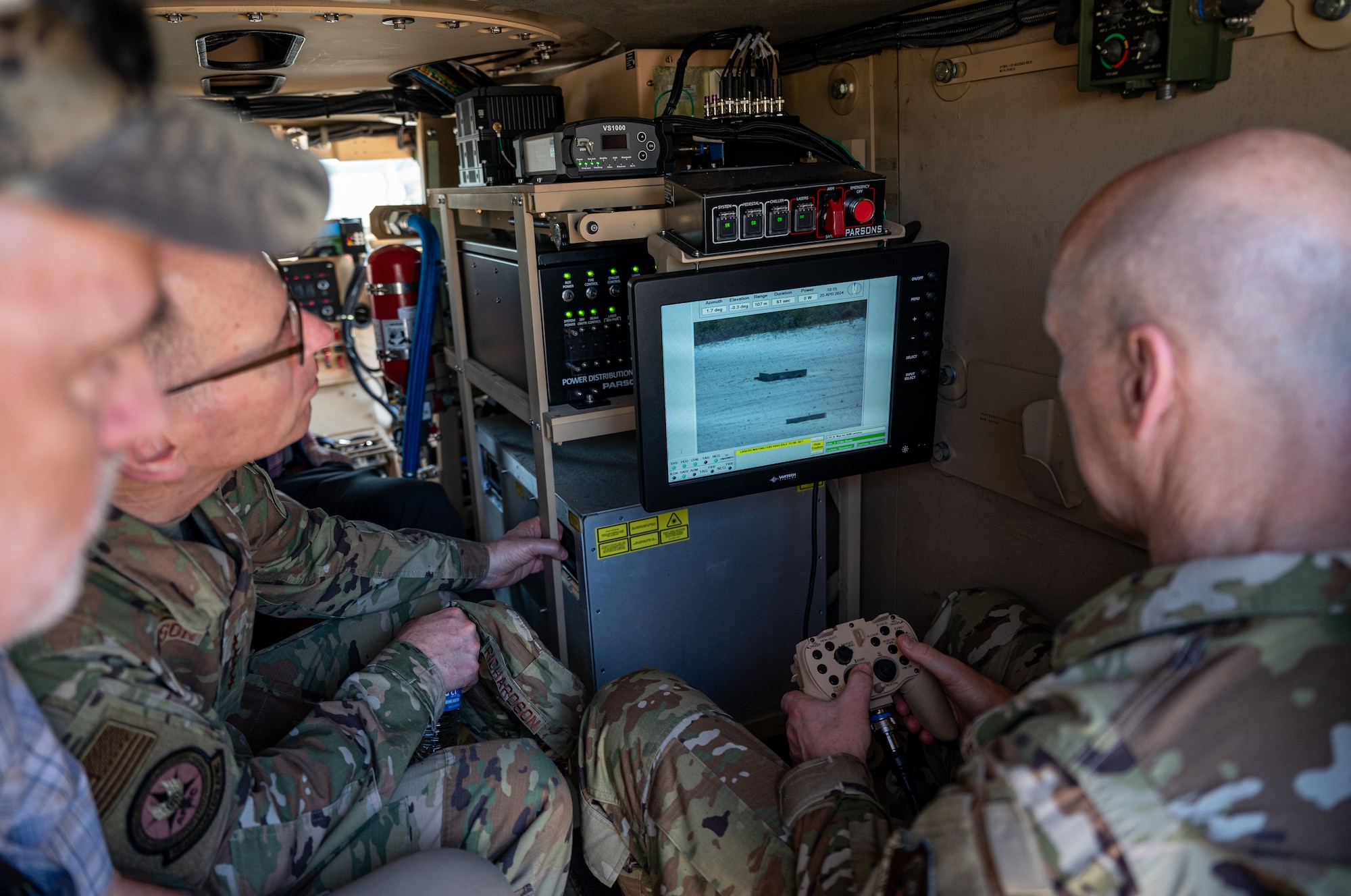 Airmen view a screen