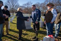 Members of the 1st Battalion 5th Infantry Regiment "Bobcats" meet for a 20th anniversary of their deployment to Mosul, Iraq during Operation Iraqi Freedom and commemorate the 19th anniversary of the passing of their colleague, Sgt. Stephen R. Sherman, who was killed in action by an improvised explosive device, on Feb. 3, at Arlington National Cemetery, in Arlington, Va. The Bobcats provided a wreath that was laid at the Tomb of the Unknown Soldier by Sherman’s mother who was accompanied by the Sentinels of the 3d U.S. Infantry Regiment – The Old Guard. After laying a wreath at the Tomb of the Unknown Soldier in Sherman’s honor, the Bobcats paid tribute to Sherman, and his surviving mother, by visiting his headstone and recalling stories of Sherman. Sherman’s mother closed the commemorative gathering by distributing coins dedicated to Sherman’s memory.