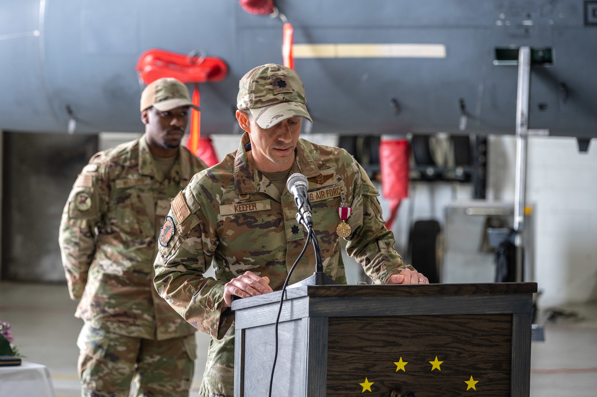U.S. Air Force Lt. Col. Stephen Keefer, outgoing 4th Operational Support Squadron commander, gives a speech during the OSS change of command ceremony on Seymour Johnson Air Force Base, North Carolina, April 22, 2024. The ceremony was conducted to commemorate the passing of command of the 4 OSS from Lt. Col. Stephen Keefer to Lt. Col. Harry Starnes. (U.S. Air Force photo by Airman 1st Class Leighton Lucero)