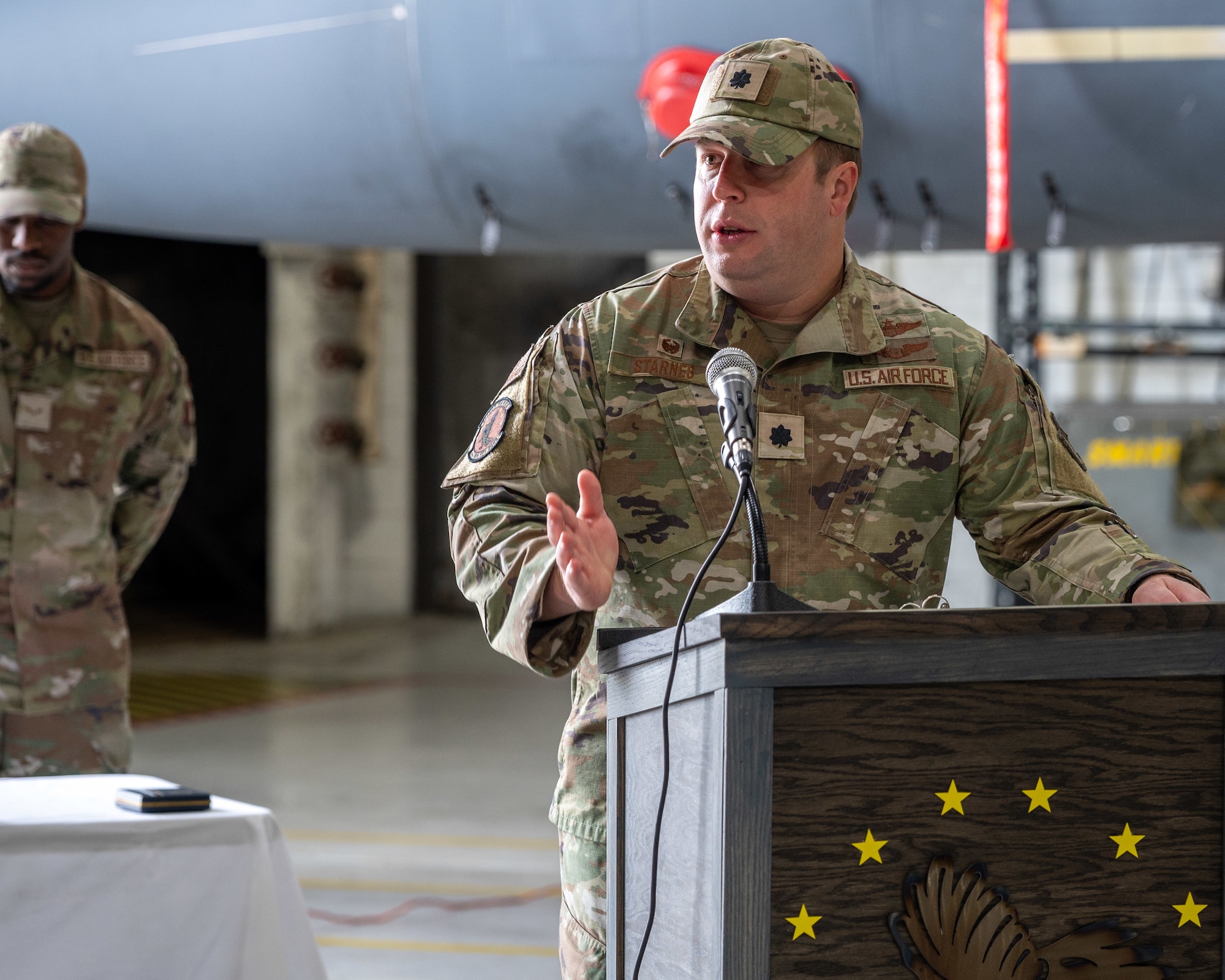 U.S. Air Force Lt. Col. Harry Starnes, incoming 4th Operational Support Squadron commander, gives a speech during the OSS change of command ceremony on Seymour Johnson Air Force Base, North Carolina, April 22, 2024. The ceremony was conducted to commemorate the passing of command of the 4 OSS from Lt. Col. Stephen Keefer to Lt. Col. Harry Starnes. (U.S. Air Force photo by Airman 1st Class Leighton Lucero)