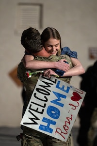 U.S. Air Force Capt. Ross Obenschain, assigned to the 58th Rescue Squadron (RQS), embraces his loved one as he returns home to Nellis Air Force Base, Nevada, April 9, 2024.