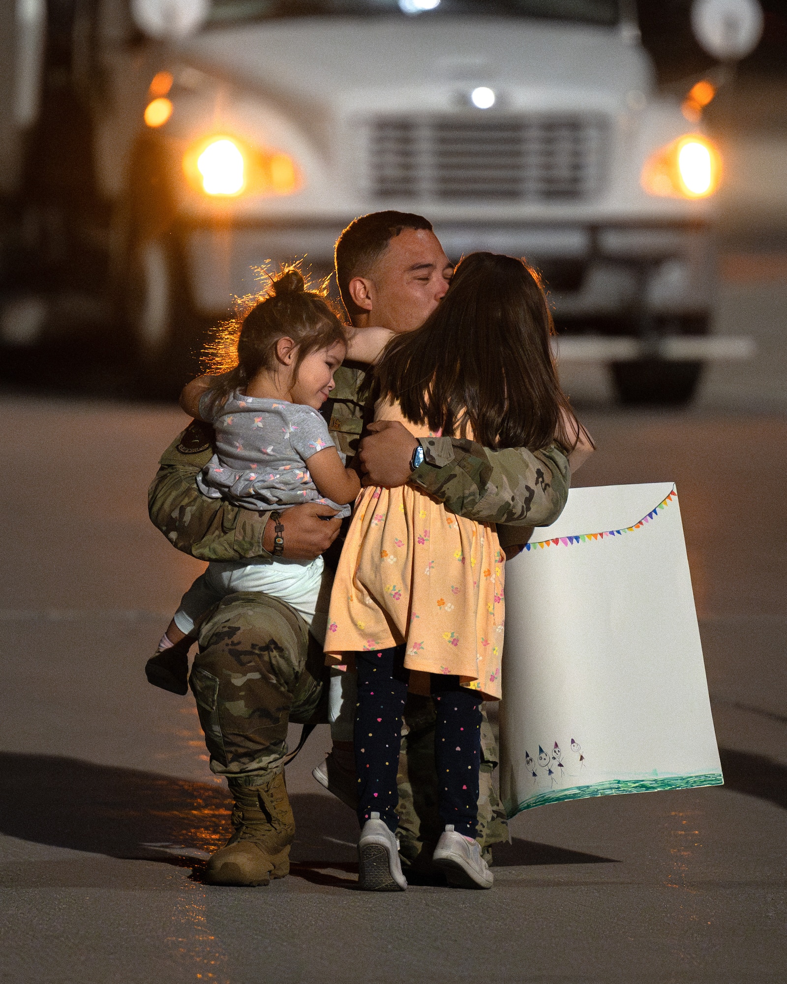U.S. Air Force Tech. Sgt. Leo Matos, assigned to the 58th Rescue Squadron (RQS), reunites with his family following a six-month combat search and rescue rotation in support of the United States Africa Command at Nellis Air Force Base, Nevada, April 9, 2024.