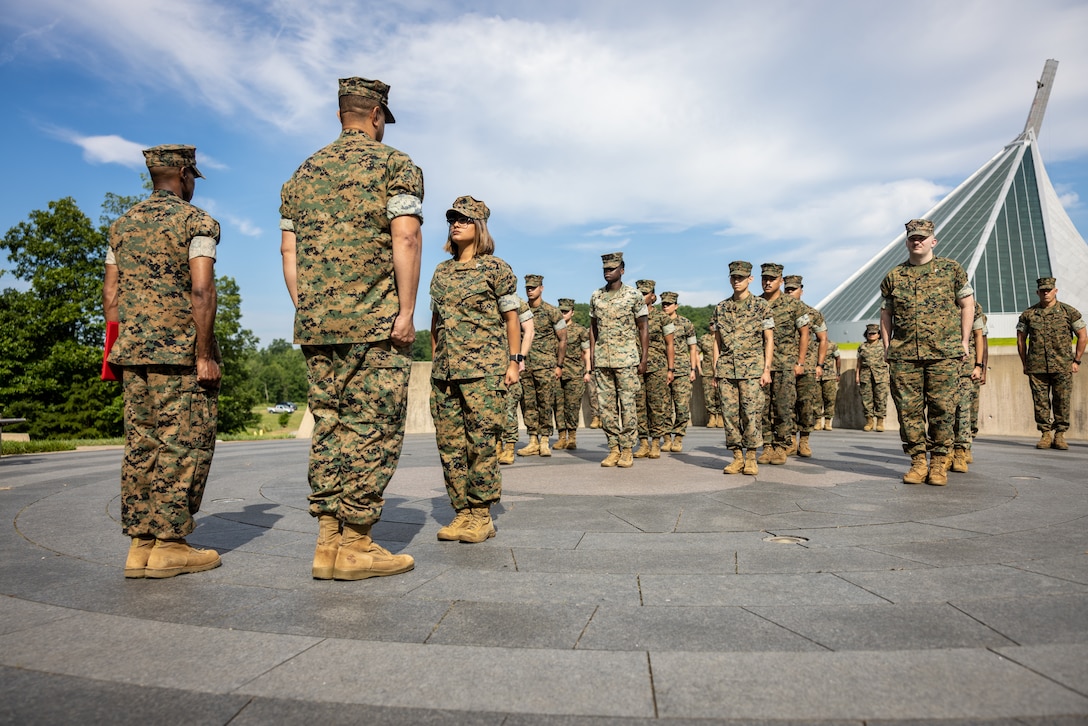 U.S. Marine Corps Cpl. Kelly MenaGarcia, a personnel noncommissioned officer in charge with Security Battalion, stands at attention during her promotion ceremony to sergeant at The National Museum of the Marine Corps, Triangle, Virginia, July 5, 2023. Promotion ceremonies are a significant achievement in a service member’s career and are a testament to their commitment, mastery of duties and skills, and leadership capabilities. Marines take on greater responsibilities as Non-Commissioned Officers after showing exemplary leadership skills. Mena Garcia is a native of South Boston, Virginia.