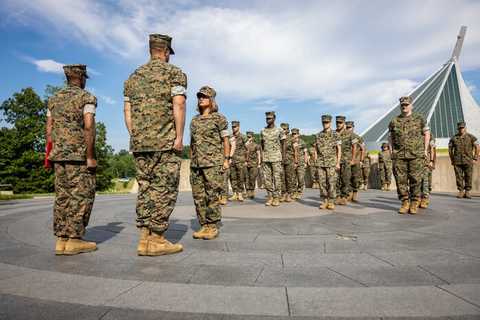 U.S. Marine Corps Cpl. Kelly MenaGarcia, a personnel noncommissioned officer in charge with Security Battalion, stands at attention during her promotion ceremony to sergeant at The National Museum of the Marine Corps, Triangle, Virginia, July 5, 2023. Promotion ceremonies are a significant achievement in a service member’s career and are a testament to their commitment, mastery of duties and skills, and leadership capabilities. Marines take on greater responsibilities as Non-Commissioned Officers after showing exemplary leadership skills. Mena Garcia is a native of South Boston, Virginia.