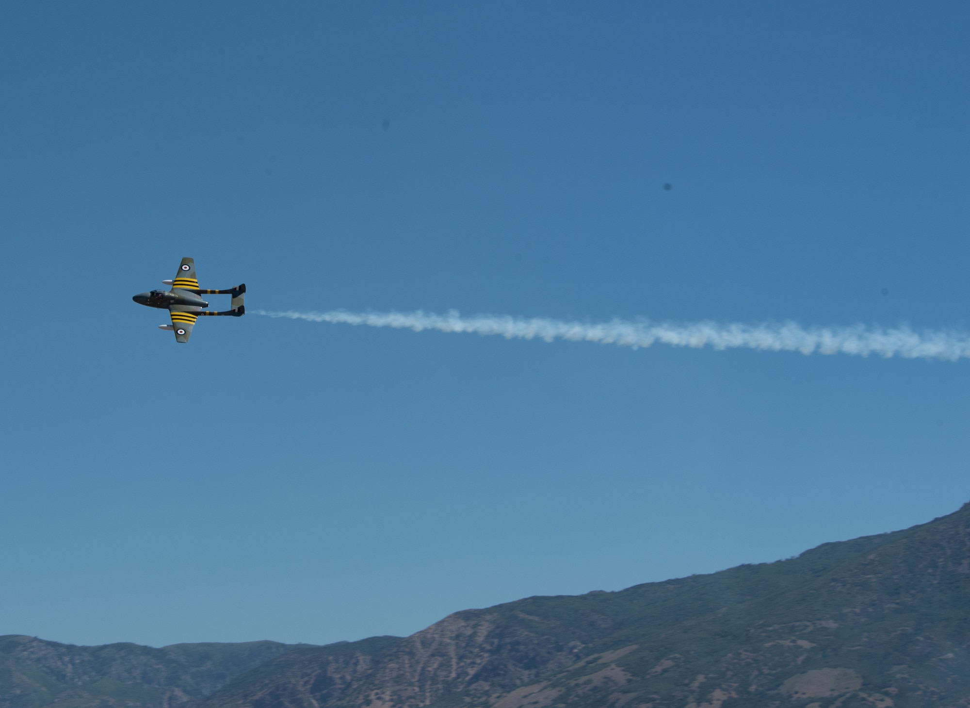 A civilian plane flies at the Hill Airshow