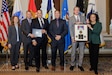 Members of the Aviation and Missile Command Threat Support Branch received a presidential award during a ceremony held at the White House in Washington, D.C., April 16. The Killian Award recognizes excellence in the intelligence community. The team received the award in the category of mission support for their significant contributions in support of the Program Executive Office — Missiles and Space. Pictured left to right: Diane Randon, principal deputy chief of staff for intelligence – Army, James A Winnefeld, President’s Intelligence Advisory Board chairman, Frank Vegerita, AMCOM Intelligence Division threat branch chief, Michael Fields, AMCOM Intelligence Division, Joshua May, AMCOM Intelligence Division, Stacey Dixon, principal deputy director of national intelligence.