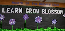 A sign for the Month of the Military Child is displayed at North Plains Elementary School, Minot Air Force Base, North Dakota, April 26, 2024. Each year during the month of April, the Department of Defense joins national, state, and local government, schools, military serving organizations, companies and private citizens in celebrating military children and the sacrifices they make. (U.S. Air Force photo by Airman 1st Class Kyle Wilson)