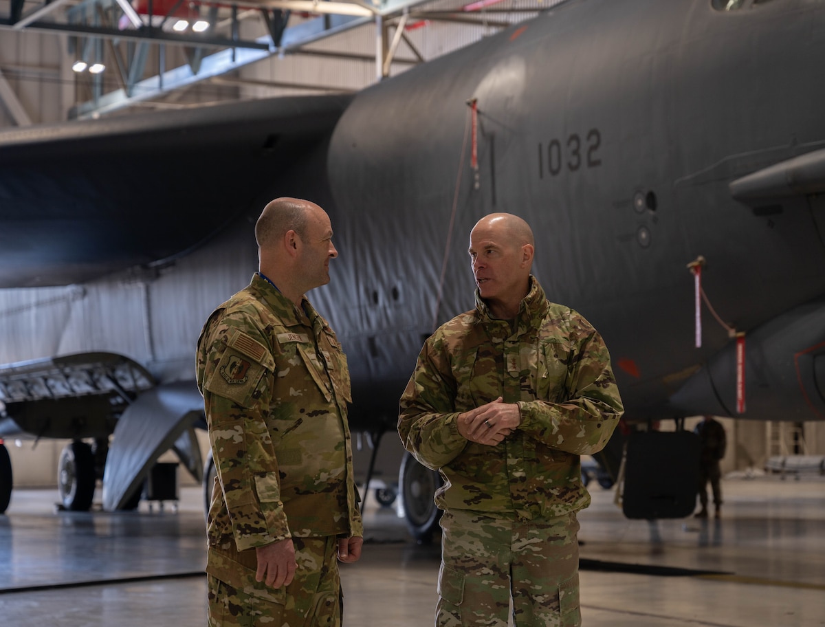 Lt. Gen. Micheal J. Lutton, deputy commander of Air Force Global Strike Command, talks to Col. Benjamin Jensen, 5th Bomb Wing commander, during a tour of Dock 7 at Minot Air Force Base, North Dakota, April 22, 2024. AFGSC provides strategic deterrence, global strike capability, and combat support to U.S. Strategic Command and the geographic combatant commands. (U.S. Air Force photo by Airman 1st Class Luis Gomez)