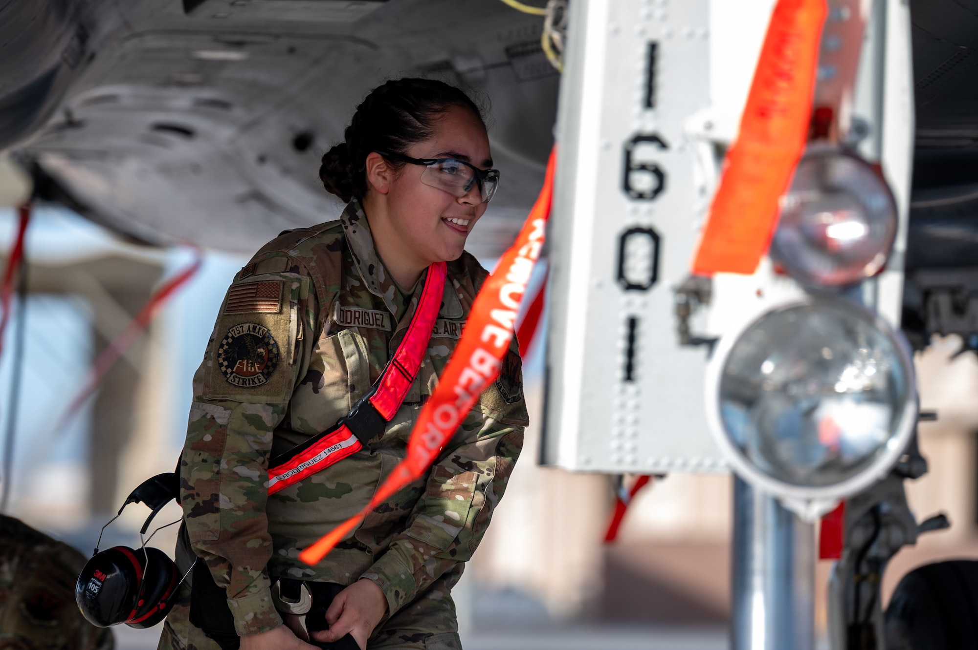 U.S. Air Force Airman 1st Class Sonia Rodriguez, a weapons load crew member assigned to the 757th Aircraft Maintenance Squadron Strike Aircraft Maintenance Unit, participates in a load crew of the first quarter competition at Nellis Air Force Base, Nevada, April 12, 2024.