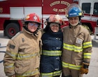 A photo of a group of female firefighters.