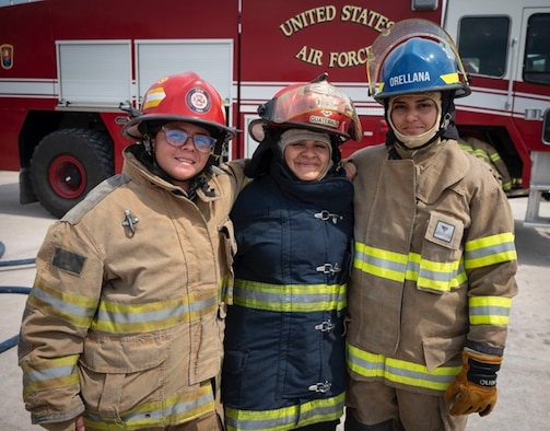 A photo of a group of female firefighters.
