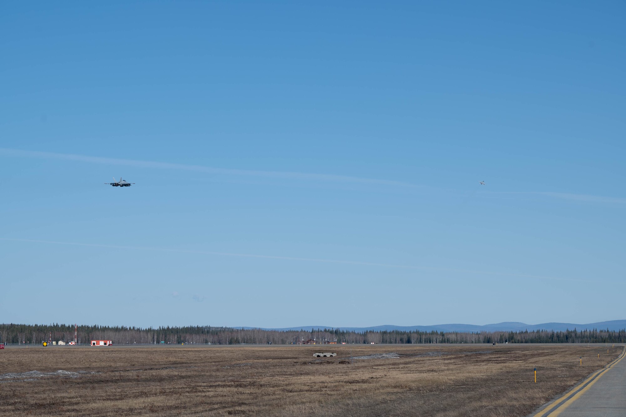 Growler aircraft fly through the air during Red Flag-Alaska 24-1.