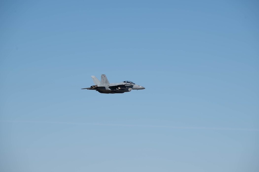 An EA-18G Growler assigned to U.S. Navy Electronic Attack Squadron (VAQ-131) flies through the air during Red-Flag Alaska 24-1.