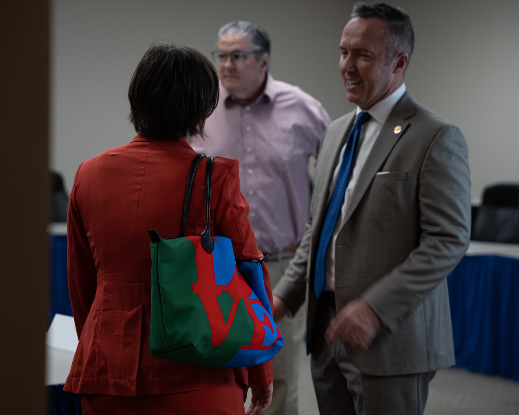 Clovis Mayor Mike Morris greets Susan Veazey, Regional Director of the Department of Defense’s Office of Local Defense Community Cooperation, at a working luncheon at City Hall in Clovis, N.M., April 24, 2024. OLDCC, in coordination with other federal agencies, delivers a program that enables states, local governments, and communities to plan and carry out civilian responses to workforce, business, and community needs arising from Defense actions. (U.S. Air Force photo by Senior Airman Parra)