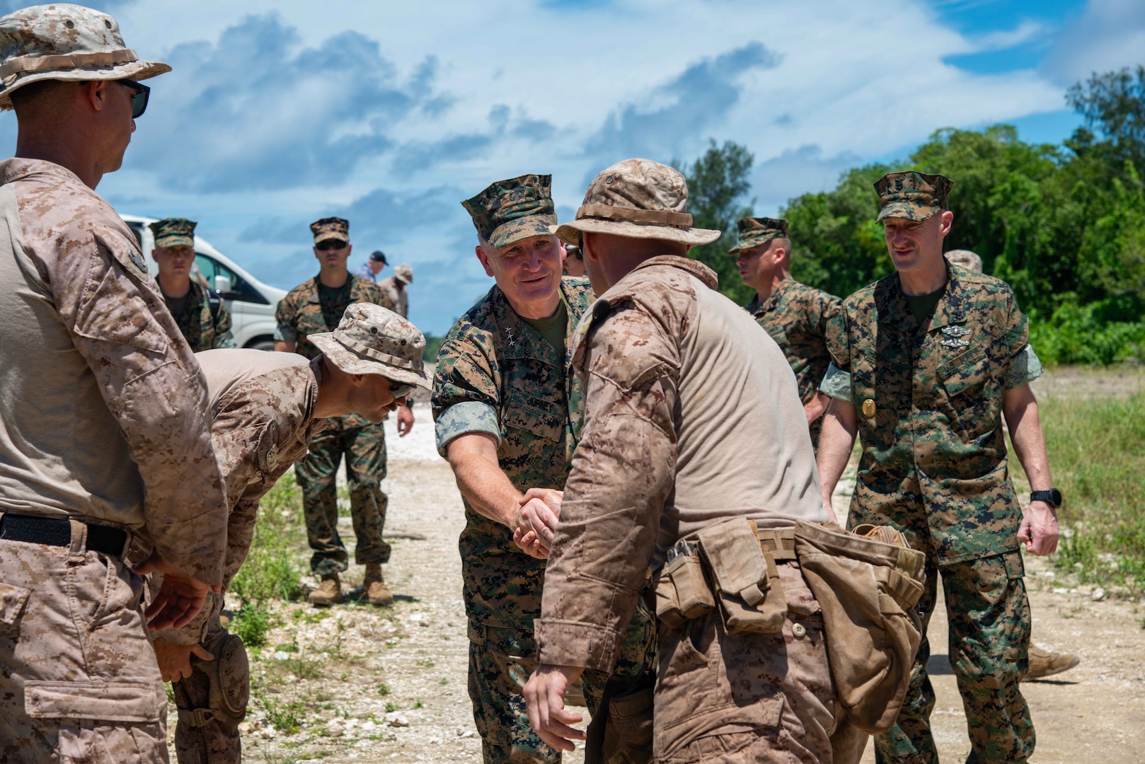 U.S. Marine Corps Lt. Gen. William M. Jurney, commander, U.S. Marine Corps Forces, Pacific, meets explosive ordnance disposal technicians with the Marine Corps Engineer Detachment-Palau 24.1 at the construction site for the Peleliu Airfield, Apr. 25. Jurney traveled to Palau to meet with local and military leaders to discuss regional defense partnerships and opportunities. Palau is one of the Compact of Free Association states aligned with the United States, which provides defense, funding, and access to social services. (U.S. Navy photo by Mass Communication Specialist 1st Class Samantha Jetzer)