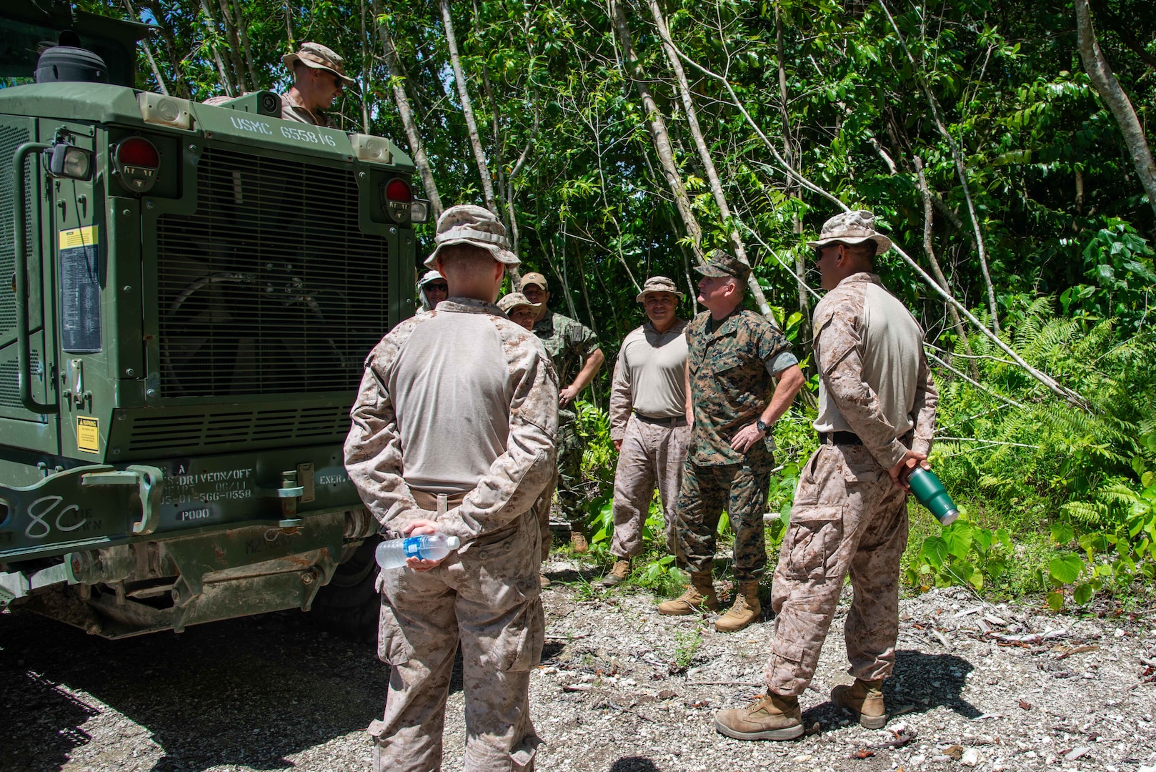 U.S. Marine Corps Lt. Gen. William M. Jurney, commander, U.S. Marine Corps Forces, Pacific, meets Marines with the Marine Corps Engineer Detachment-Palau 24.1 at the construction site for the Peleliu Airfield, Apr. 25. Jurney traveled to Palau to meet with local and military leaders to discuss regional defense partnerships and opportunities. Palau is one of the Compact of Free Association states aligned with the United States, which provides defense, funding, and access to social services. (U.S. Navy photo by Mass Communication Specialist 1st Class Samantha Jetzer)