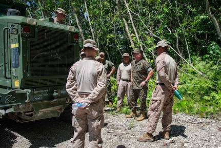 U.S. Marine Corps Lt. Gen. William M. Jurney, commander, U.S. Marine Corps Forces, Pacific, meets Marines with the Marine Corps Engineer Detachment-Palau 24.1 at the construction site for the Peleliu Airfield, Apr. 25. Jurney traveled to Palau to meet with local and military leaders to discuss regional defense partnerships and opportunities. Palau is one of the Compact of Free Association states aligned with the United States, which provides defense, funding, and access to social services. (U.S. Navy photo by Mass Communication Specialist 1st Class Samantha Jetzer)