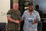 U.S. Marine Corps Lt. Gen. William M. Jurney, commander, U.S. Marine Corps Forces, Pacific, presents a gift to Gov. Emais Roberts at the office of the governor in Peleliu Apr. 25. Jurney traveled to Palau to meet with local and military leaders to discuss regional defense partnerships and opportunities. Palau is one of the Compact of Free Association states aligned with the United States, which provides defense, funding, and access to social services. (U.S. Navy photo by Mass Communication Specialist 1st Class Samantha Jetzer)