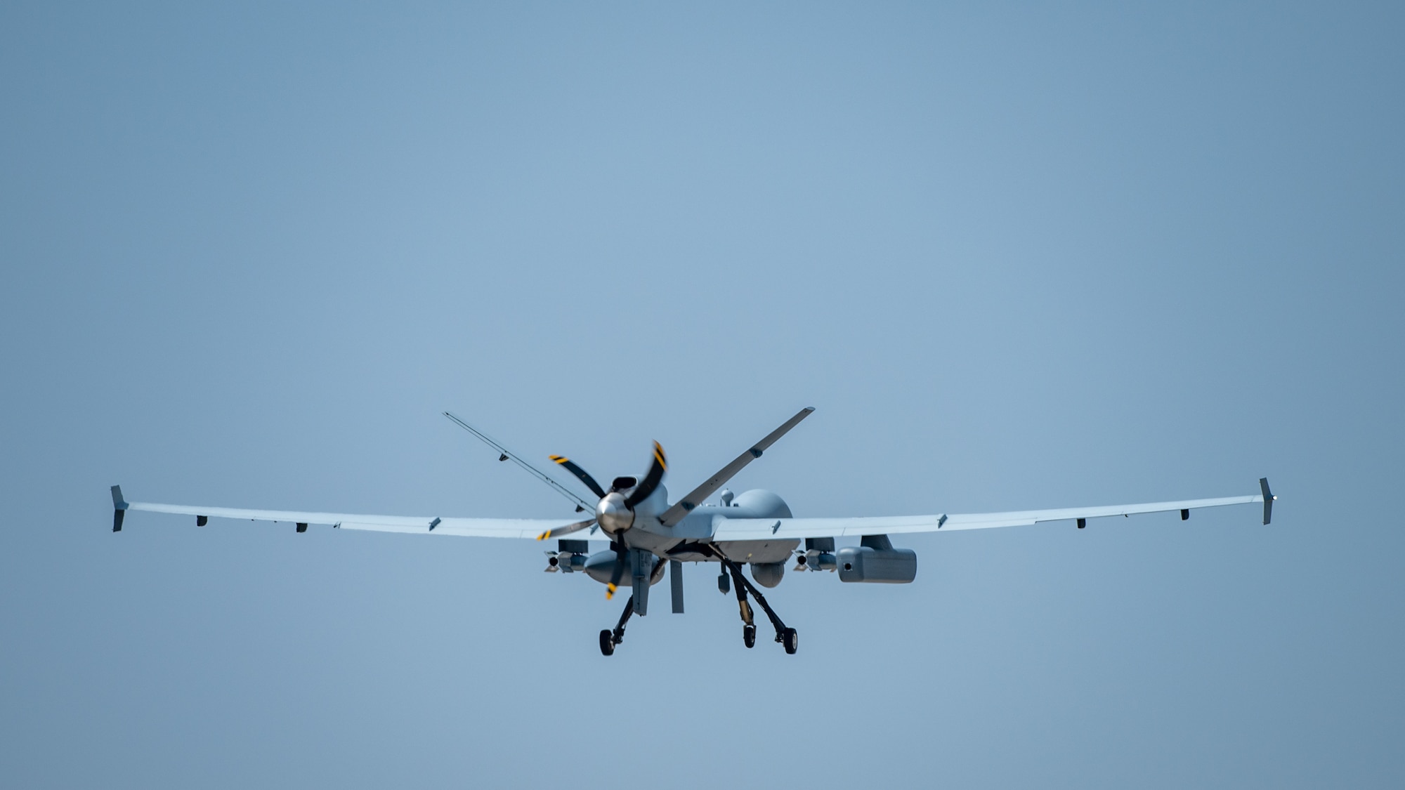 A U.S. Air Force MQ-9 Reaper flies overhead after taking off from the flightline at Kunsan Air Base, Republic of Korea, April 19, 2024.