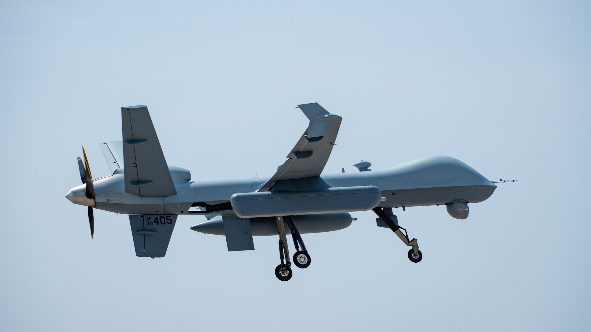 A U.S. Air Force MQ-9 Reaper flies overhead after taking off from the flightline at Kunsan Air Base, Republic of Korea, April 19, 2024.