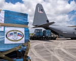 Airmen from the 482d Fighter Wing and Special Operations Command South (SOCSOUTH) join forces with the 317th Airlift Wing, who provided their C-130 Hercules, blaze the trail in loading pallets of medical supplies and electrolyte solution at Homestead Air Reserve Base, Fla., on April 26, 2024. This humanitarian aid, contributed by NGOs including Hope to Haiti, Medicine for All People International, and Lift Logistics, was delivered to Port-au-Prince, Haiti, under the coordination of the U.S. Southern Command (SOUTHCOM) through the Denton Program. (U.S. Air Force photo by Tech. Sgt. Lionel Castellano)