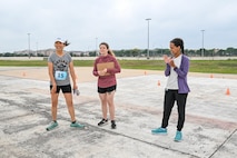 Maj. Myunghee Choi, 959th Surgical Operations Squadron clinical nurse, receives a gift card for being the first adult female to finish the Alcohol Awareness Month 5K at Wilford Hall Ambulatory Surgical Center, Joint Base San Antonio-Lackland, Texas, April 27, 2024. The Alcohol and Drug Abuse Prevention and Treatment program states that over 20 percent of service members report heavy drinking, defined as consuming 8 or more drinks per week for women and 15 or more for men, with alcohol use in this population also linked to an increased risk of suicide. Anyone with questions or concerns can contact ADAPT at 210-292-7560. (Air Force photo by Senior Airman Melody Bordeaux)