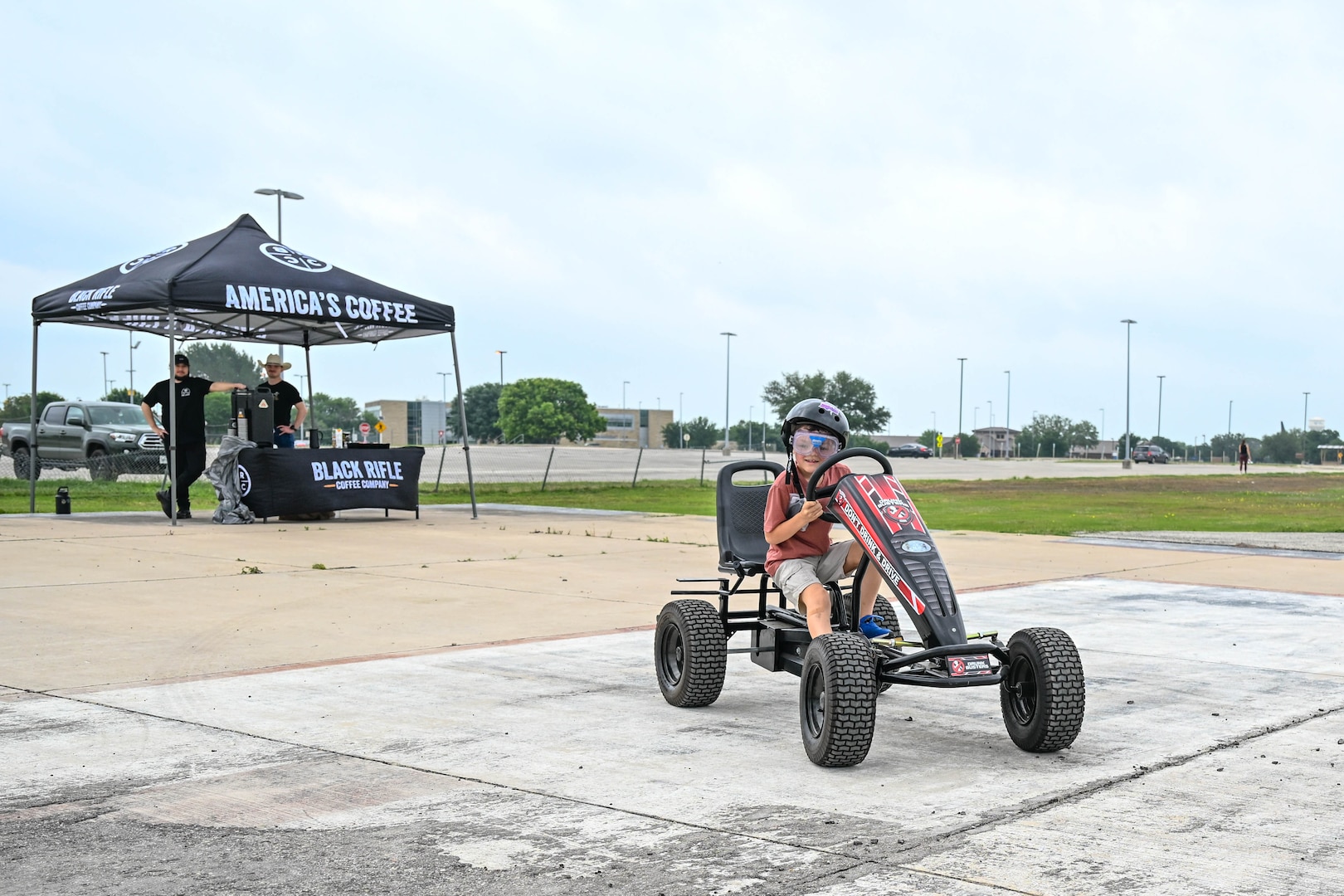 Killian Hawkins, 1st Lt. Jacqueline Hawkins’ son, wears drunk goggles and rides a quadcycle during an Alcohol Awareness Month 5K at Wilford Hall Ambulatory Surgical Center, Joint Base San Antonio-Lackland, Texas, April 27, 2024. He shared while wearing the drunk goggles he saw two of everything. To promote awareness of alcohol misuse, attendees participating in this simulation may gain an understanding of the effects of inebriation while driving. (Air Force photo by Senior Airman Melody Bordeaux)