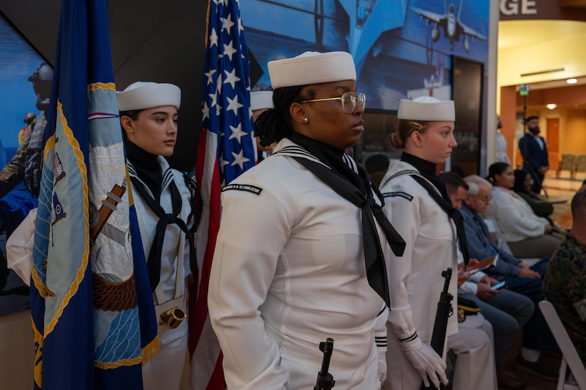 A photo of a Color Guard in formation.