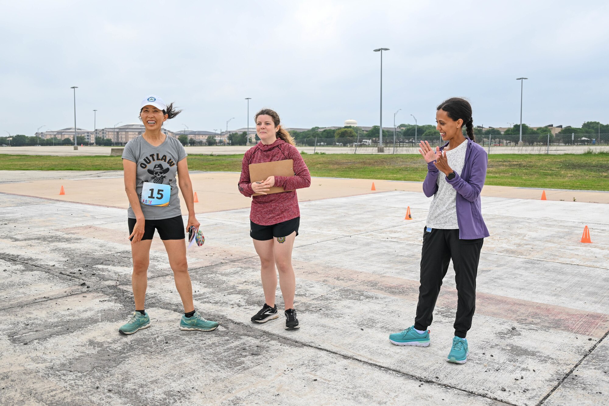 Maj. Myunghee Choi, 959th Surgical Operations Squadron clinical nurse, receives a gift card for being the first adult female to finish the Alcohol Awareness Month 5K at Wilford Hall Ambulatory Surgical Center, Joint Base San Antonio-Lackland, Texas, April 27, 2024. The Alcohol and Drug Abuse Prevention and Treatment program states that over 20 percent of service members report heavy drinking, defined as consuming 8 or more drinks per week for women and 15 or more for men, with alcohol use in this population also linked to an increased risk of suicide. Anyone with questions or concerns can contact ADAPT at 210-292-7560. (Air Force photo by Senior Airman Melody Bordeaux)