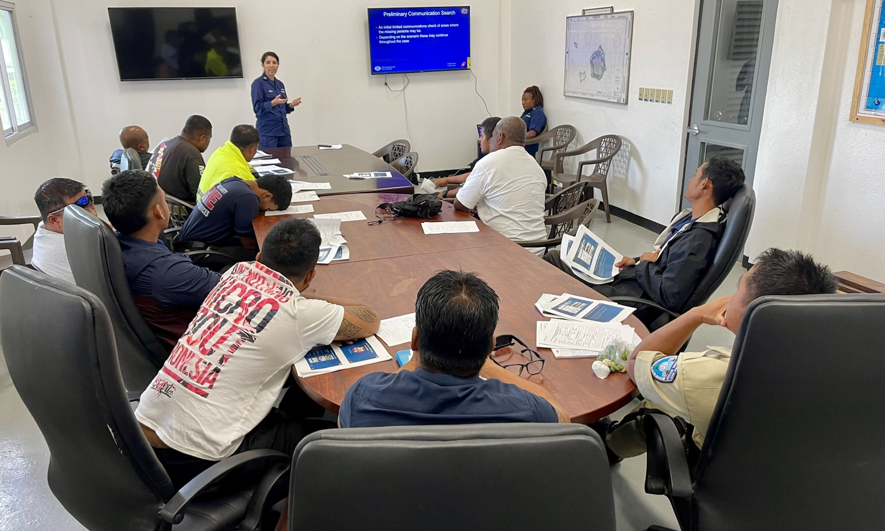 Members of U.S. Coast Guard Forces Micronesia/Sector Guam provide instruction in search and rescue planning and operations during a SAR exercise with partners in the Pohnpei State, Federated States of Micronesia, on April 18, 2024. The exercise involved comprehensive seminars and functional drills designed to strengthen SAR response across the region. Key components of the training included SAR system fundamentals, alerting procedures, communications, and a SAR OPS software demonstration, alongside an overdue vessel check sheet exercise. Participants included the Pohnpei State Division of Fire and Emergency Services and Pohnpei Division of Fish and Wildlife. (U.S. Coast Guard photo by Lt. Henry Dunphy)